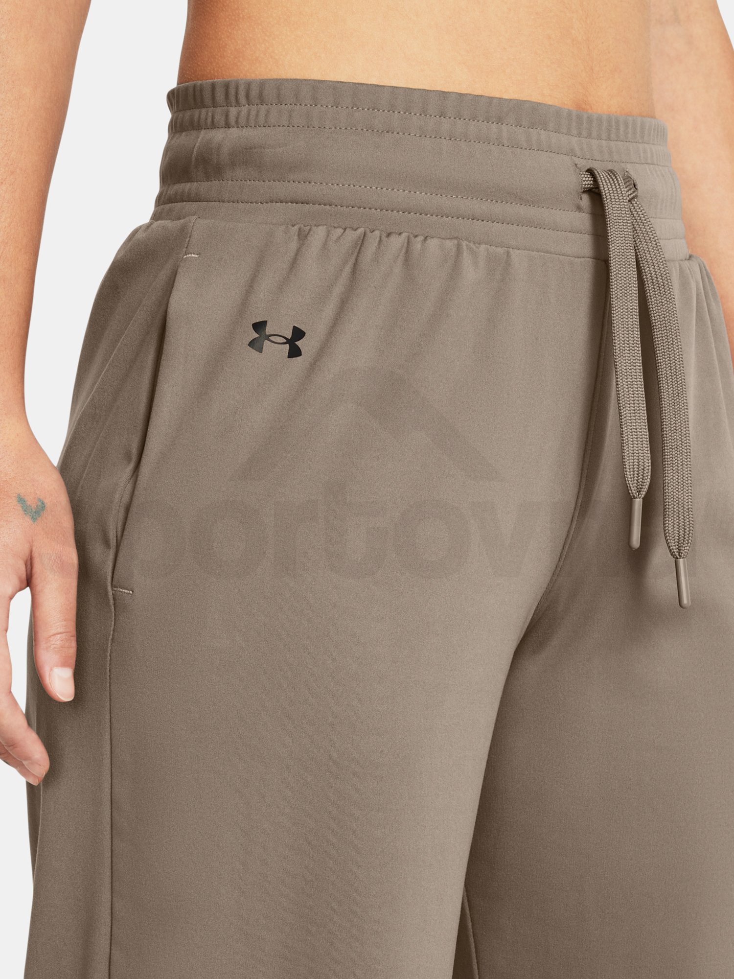 Sportovní kalhoty Under Armour Motion Open Hem Pant-BRN