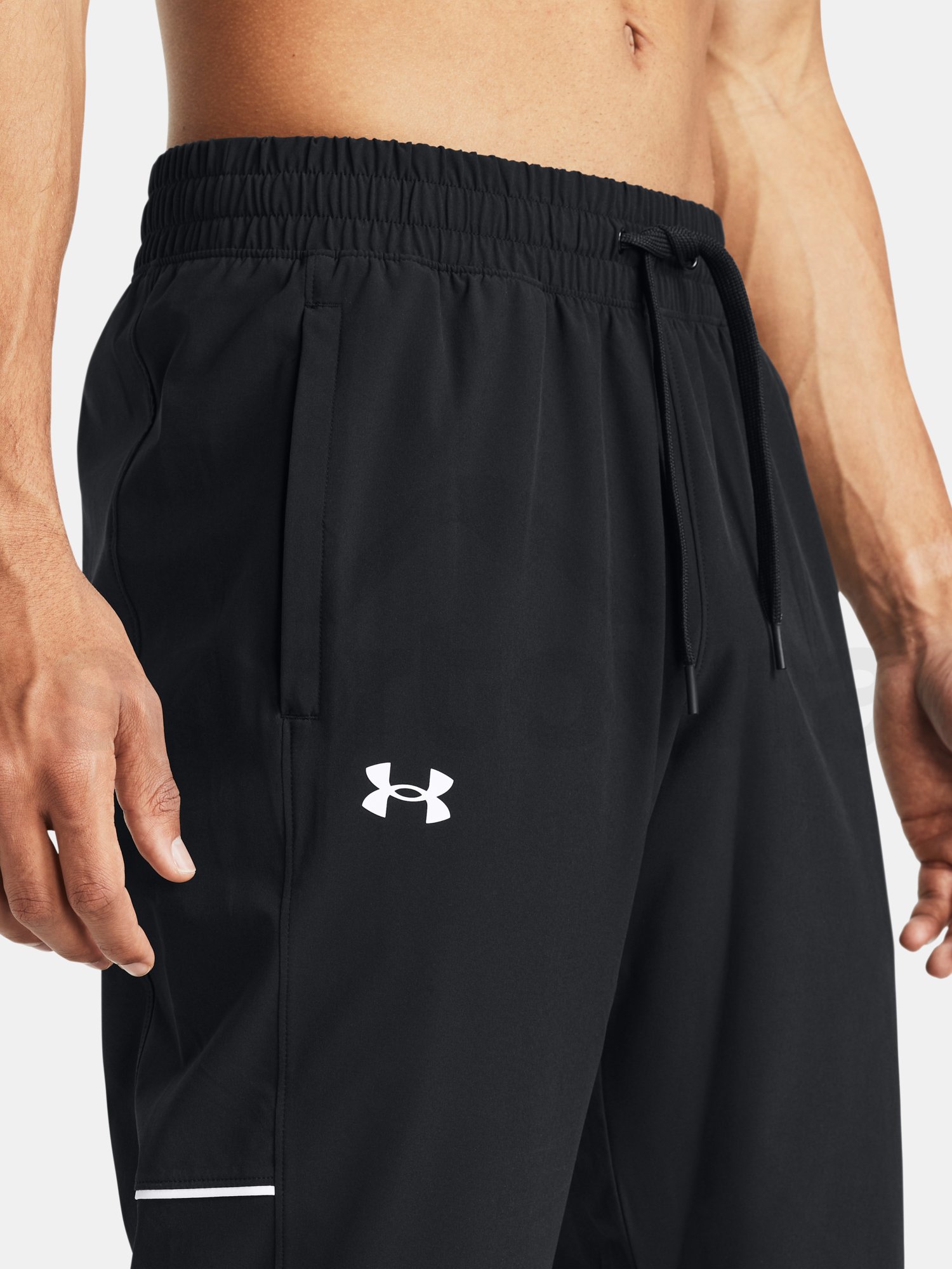 Tepláky Under Armour UA Baseline Woven Pant - čierna