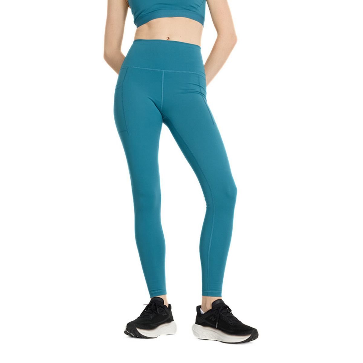 Legíny New Balance Sleek Pocket High Rise Legging 27" W - modrá