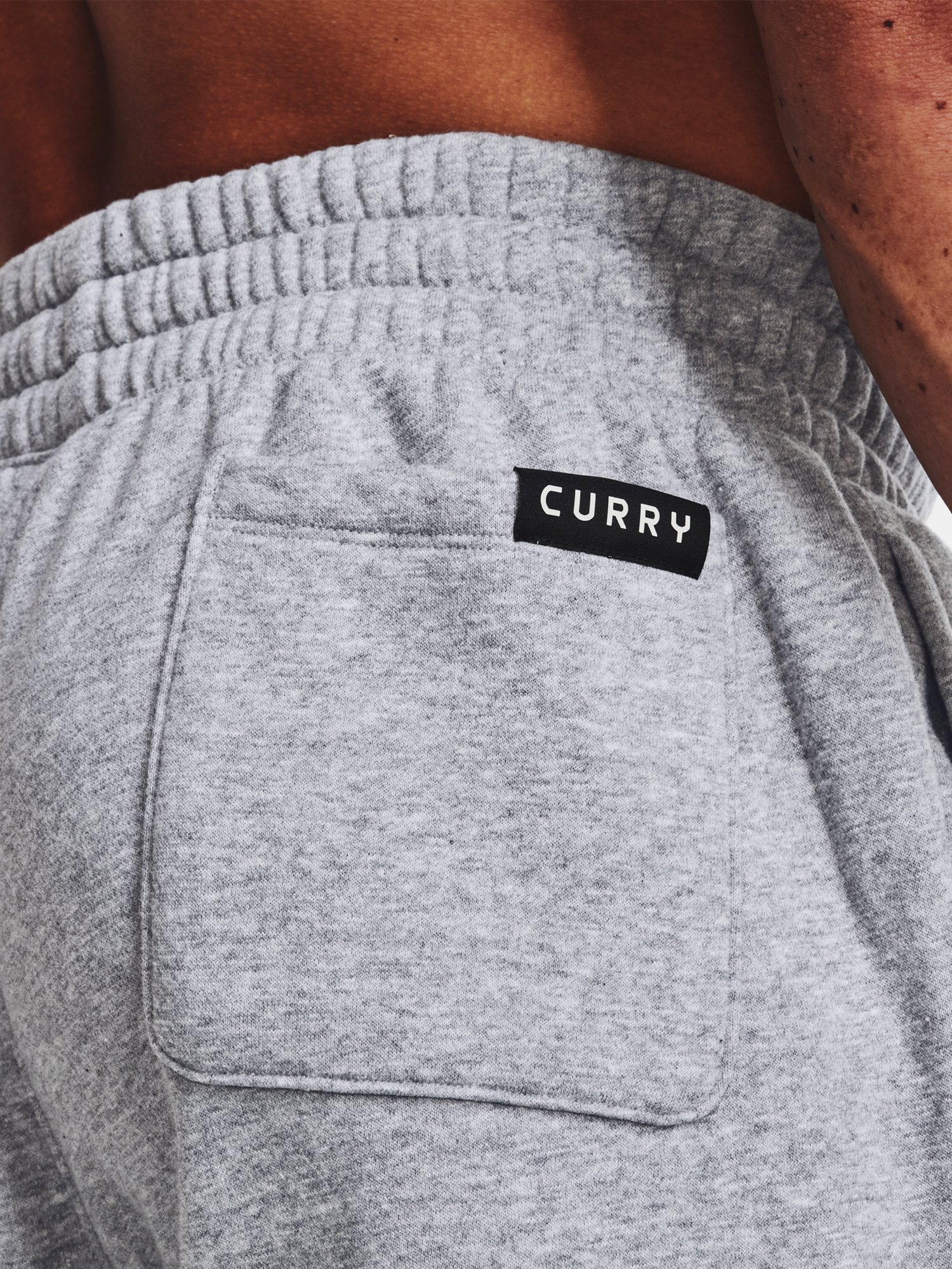 Tepláky Under Armour Curry Fleece Sweatpants - sivá